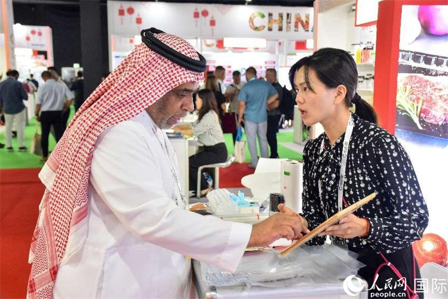 參展商交流。人民網(wǎng)塔里克·易卜拉欣攝