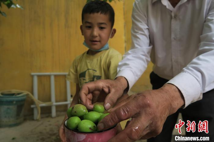 圖為進(jìn)藏先遣英雄連誓師地原址所在的新疆維吾爾自治區(qū)和田地區(qū)于田縣普魯村現(xiàn)貌?！畛坛?攝