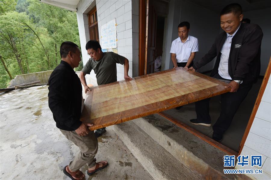 （新華全媒+）（7）千里“挪窩”，踏實開啟新生活